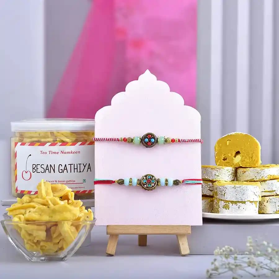 Elegant Rakhi Duo with Treats Combo