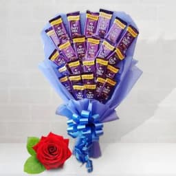 Delicious Bouquet of Cadbury Dairy Milk Chocolates with Free Single Red Rose 1