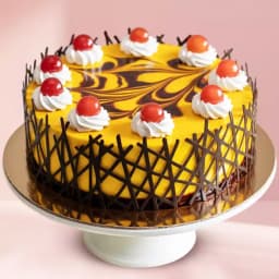 Enjoyable Eggless Pineapple Cake in Round Shape 1