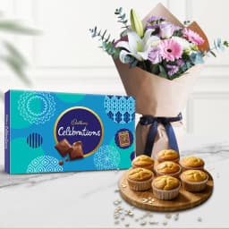 Delightful X mas Gift of Muffins with Chocolates n Flowers Bouquet 1