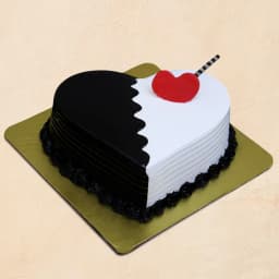Sumptuous Propose Day Gift of Chocolate Vanilla Fusion Cake in Heart Shape 1