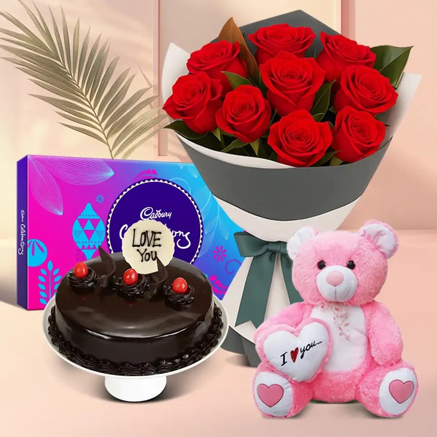 12 Exclusive Dutch Red Roses Bouquet with Cake Cadburys Assorted Chocolates and a Cute Teddy Bear(Delivery All Over India)