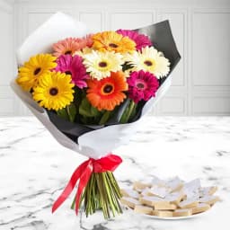 Delicious Kaju Katli and Arrangement of Mixed Gerberas 1