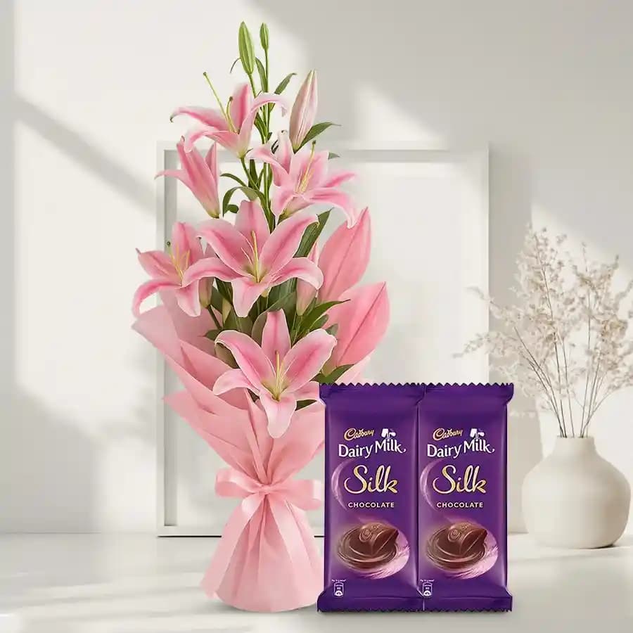 Wonderful Oriental Pink Lilies Bouquet with Dairy Milk Silk