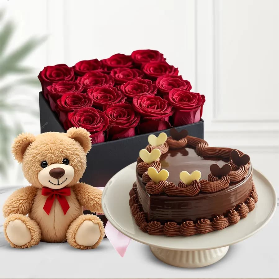 Delightful Box of Red Roses with a Heart Shape Chocolate Cake N Teddy
