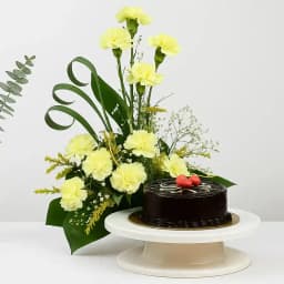Delicious Truffle Cake N White Carnations Bouquet 1