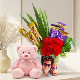Enigmatic Carnations n Cadbury Chocolates in Personalized Picture Mug with Cute Teddy 1