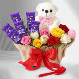 Gorgeous Display of Mixed Roses n Cadbury Dairy Milk with Teddy in Basket 1