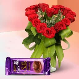 Spectacular Display of Heart Shape Red Roses in Vase with Cadbury Silk 1