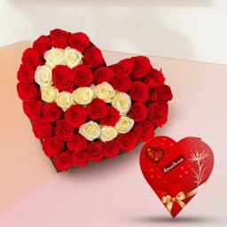 Hearty Arrangement of Red n White Roses with Heart Shape Handmade Chocolates Box 1