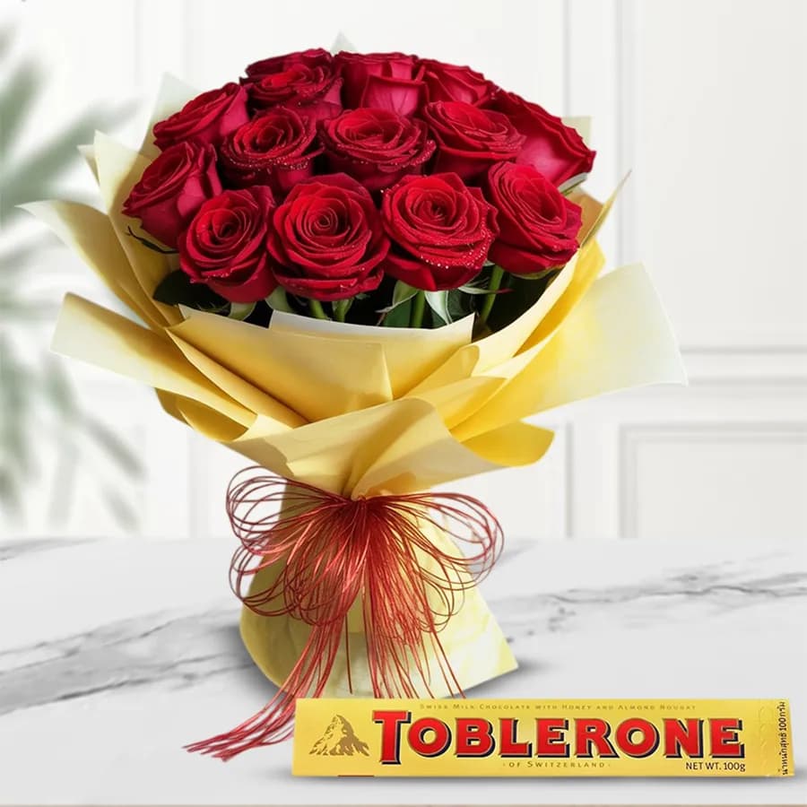 Breathtaking Red Roses Bouquet with Toblerone Exotic