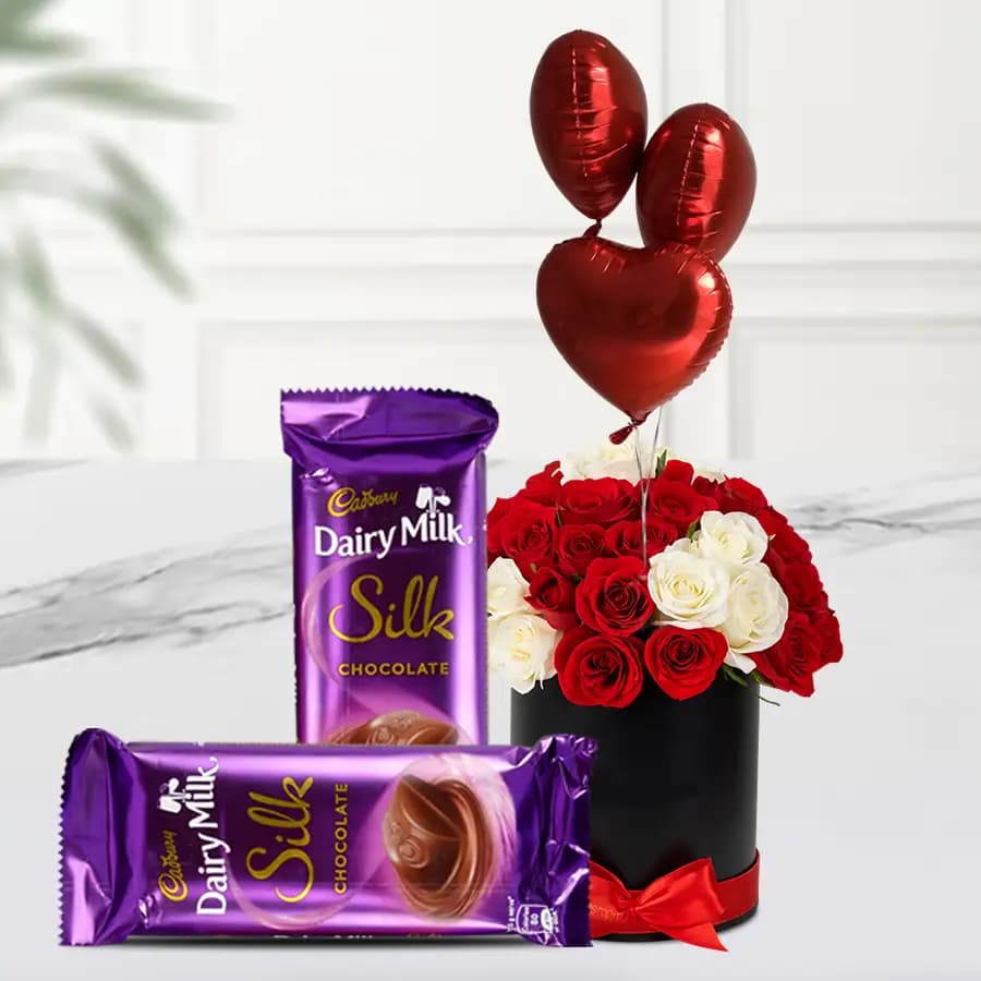 Breathtaking Black Box of Mixed Roses N Love Balloons with Cadbury Silk