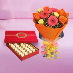 Bikanervala Mewa Bite Orange with Seasonal Flower Bouquet 1