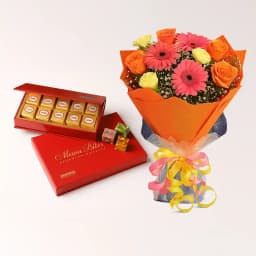 Bikanervala Mewa Bite Orange with mixed Flowers Bouquet 1