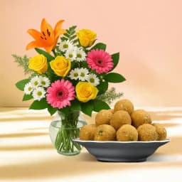 Besan Ladoo with Mixed Flower Arrangement 1