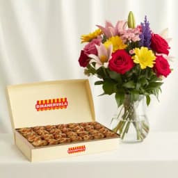 Bikanervala Pinni Special with a Mixed Flower Arrangement 1