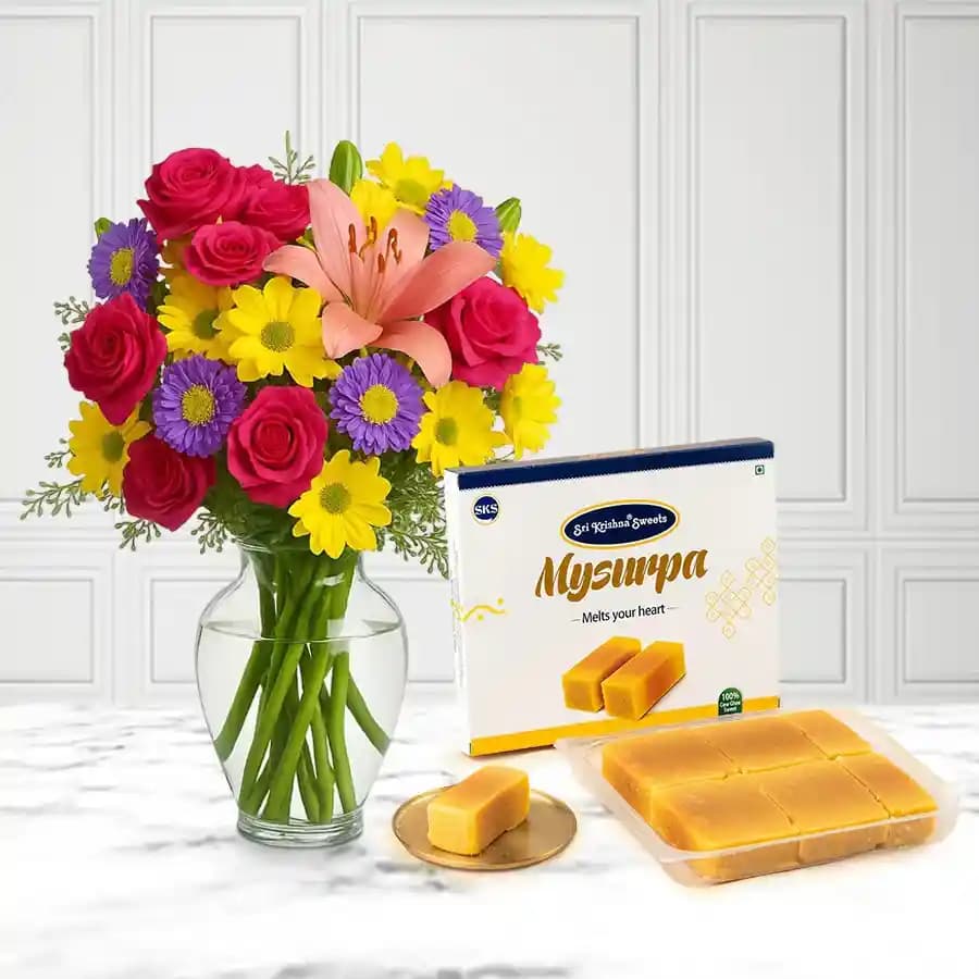 Mysurpa from Sri Krishna Sweets with a Mixed Flower Arrangement