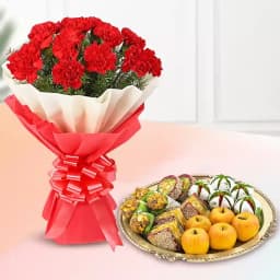 Assorted Dry Fruit Sweets from Adyar Ananda Bhawan with Red Carnation Tissue Wrapped Bouquet 1