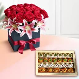 Assorted Dry Fruit Sweets from Adyar Ananda Bhawan with a Designer Flower Arrangement 1