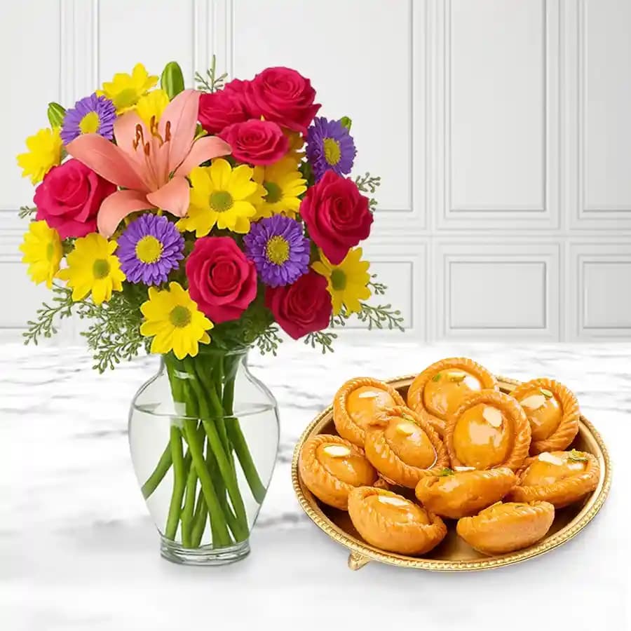 Suryakala from Dadus with a Mixed Flower Arrangement