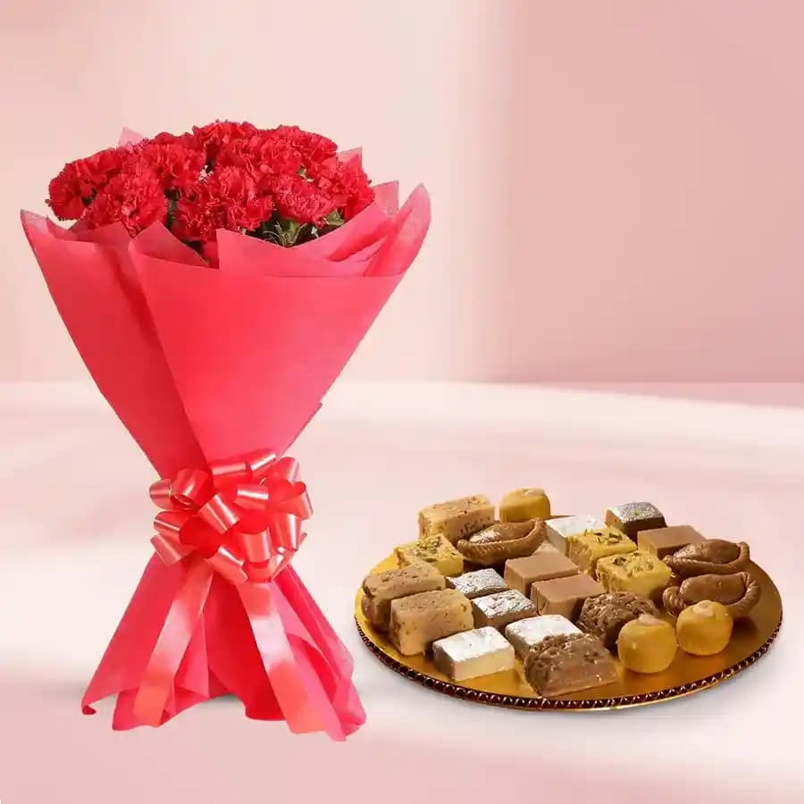 Assorted Sweets from G Pulla Reddy with Red Carnation Bouquet