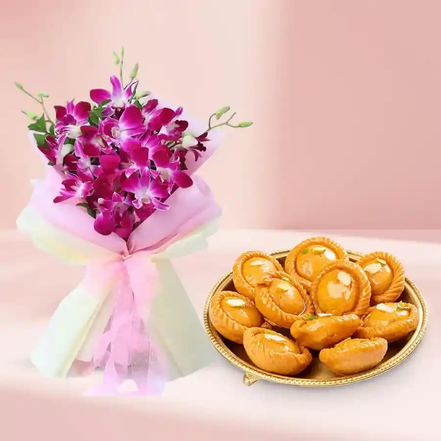 Suryakala from Dadus with Orchid Bouquet