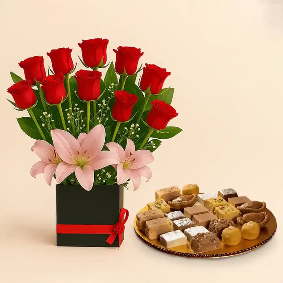 Assorted Sweets from G Pulla Reddy with Designer Flower Arrangement