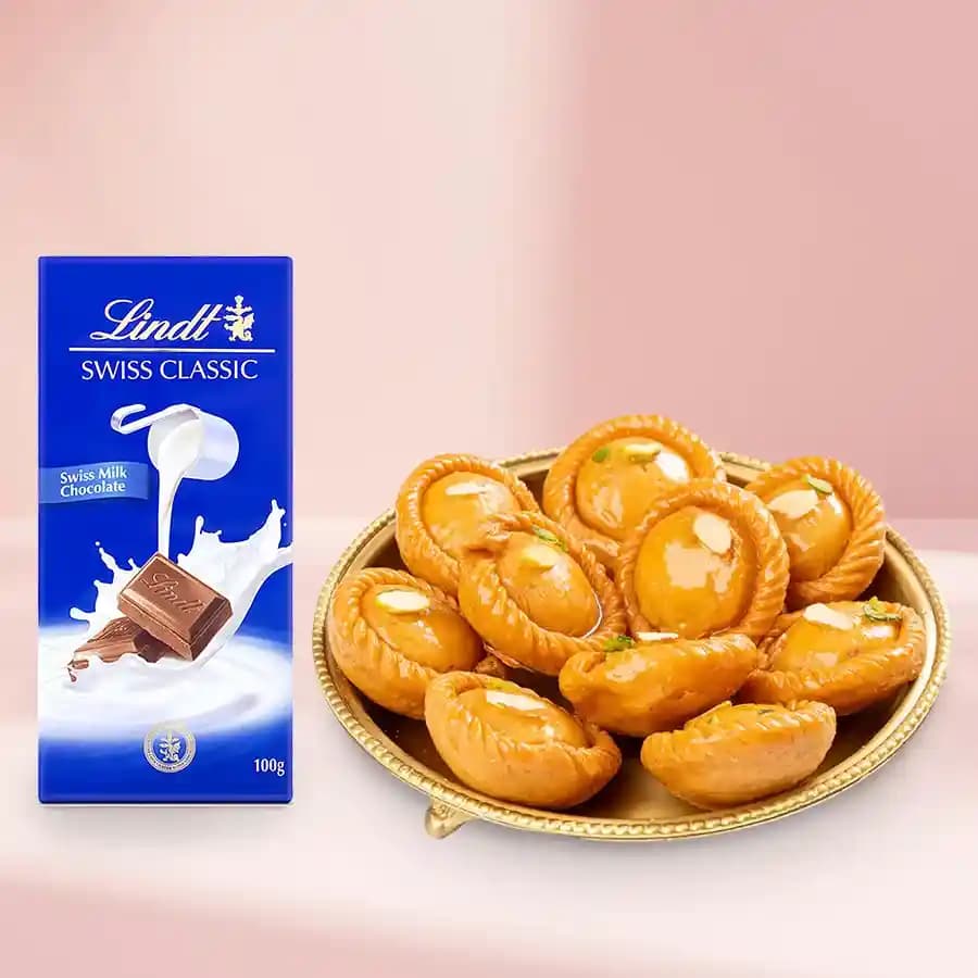 Suryakala from Dadus with Lindt Excellence Chocolate Bar