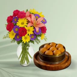 Bellam Sunni Laddu from Almond House with Mixed Flower Arrangement 1