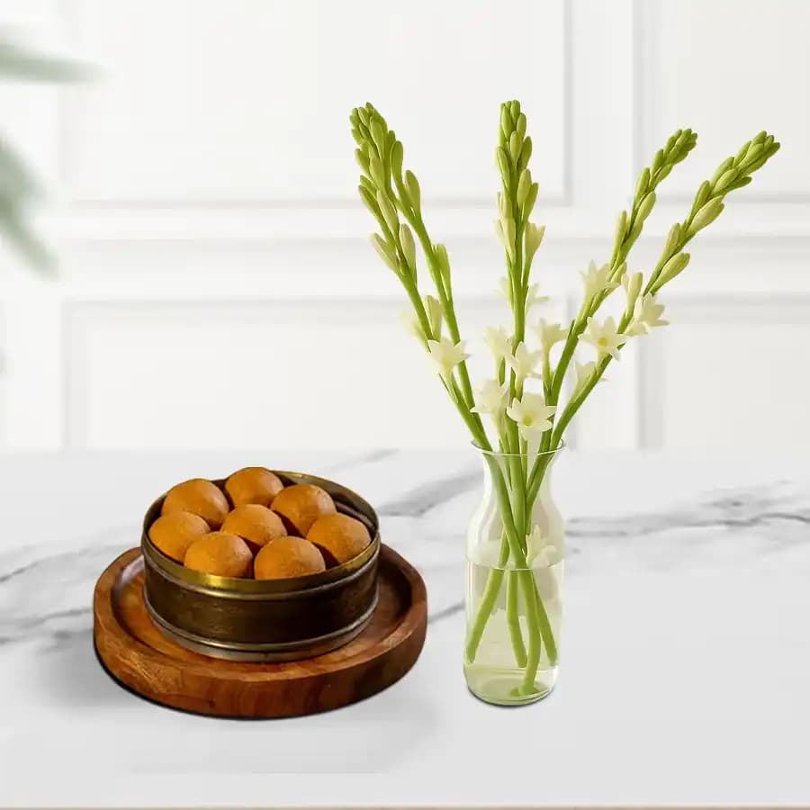 Bellam Sunni Laddu from Almond House with Rajnigandha Stems