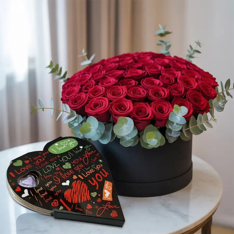 100 Exclusive Dutch Red Roses Arrangement with Heart Shaped Chocolate Box