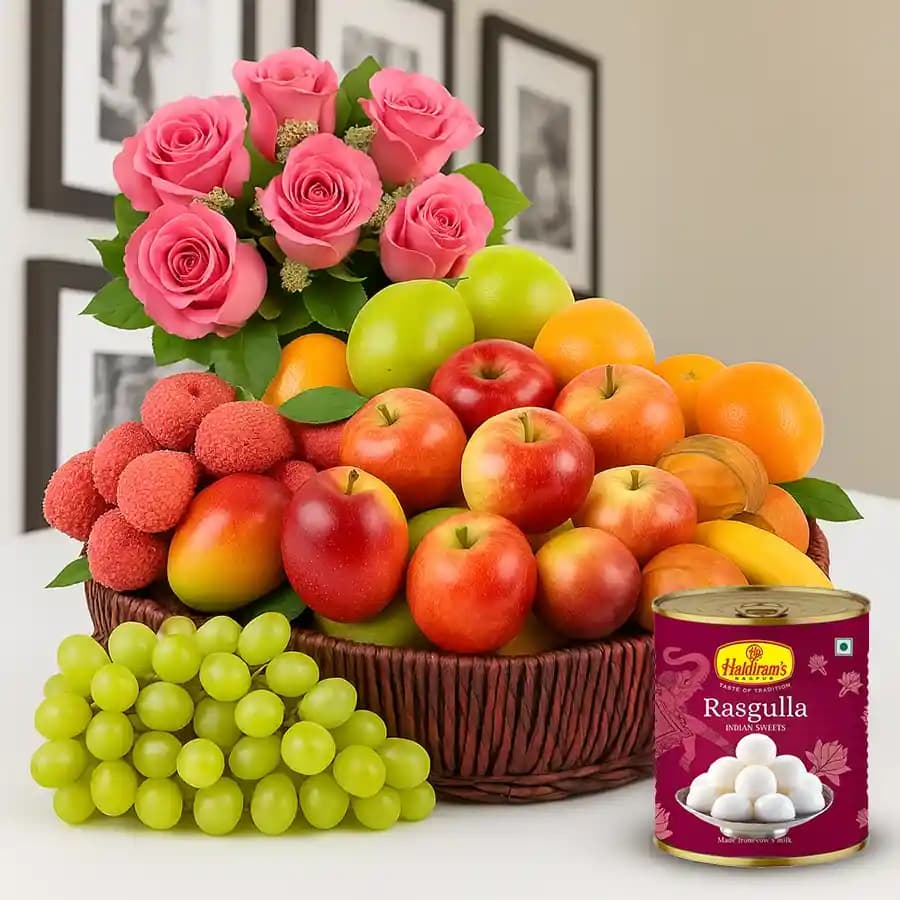 Basket Hamper of Fresh Fruits Haldiram Rasgulla and Pink Rose Bouquet for your Mom
