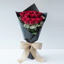 Beautiful Red Roses Bouquet in Black Tissue Wrap 1