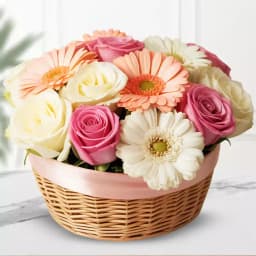 Captivating White Pink n Peach Gerberas N Roses Basket 1