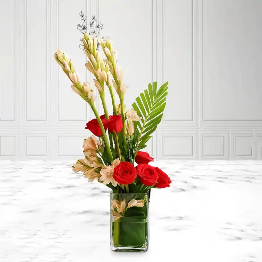 Beautiful Display of Red Roses N White Rajnigandha in a Glass Vase