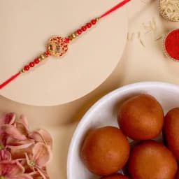 Elegant Kundan Rakhi with Sweet Temptations 1