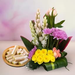 Amba Kaju Roll from Chitale Bandhu Mithaiwale with a Mixed Flower Arrangement 1