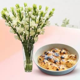 Baked Rasgulla from Balaram Mullick with Rajnigandha Stems 1