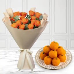 Orange Roses N Golden Laddus 1