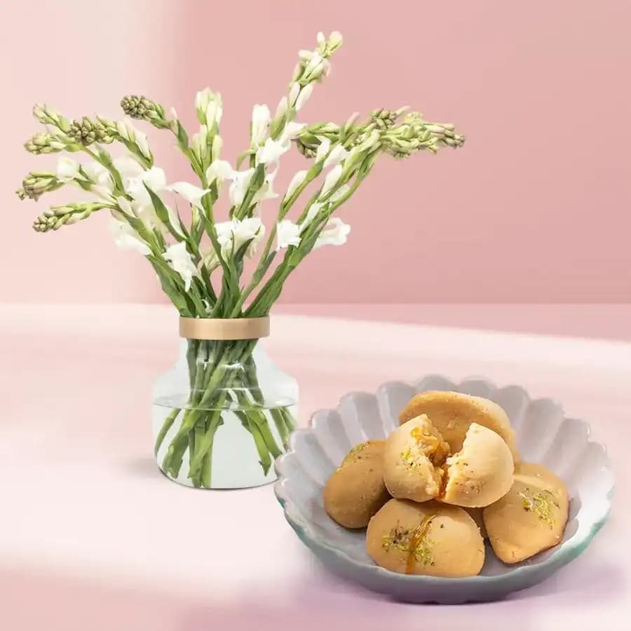 Nolen Gurer Jalbhara Sandesh from Ganguram with Rajnigandha Stems Arrangement