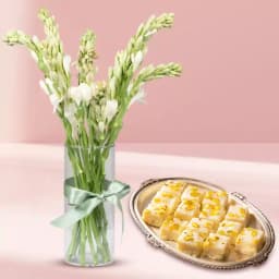 Malai Barfi from Karachi Sweet Mart with Rajnigandha Stems in Glass Vase 1
