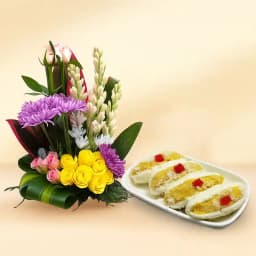 Cham Cham from Karachi Sweet Mart with a Mixed Flower Arrangement 1