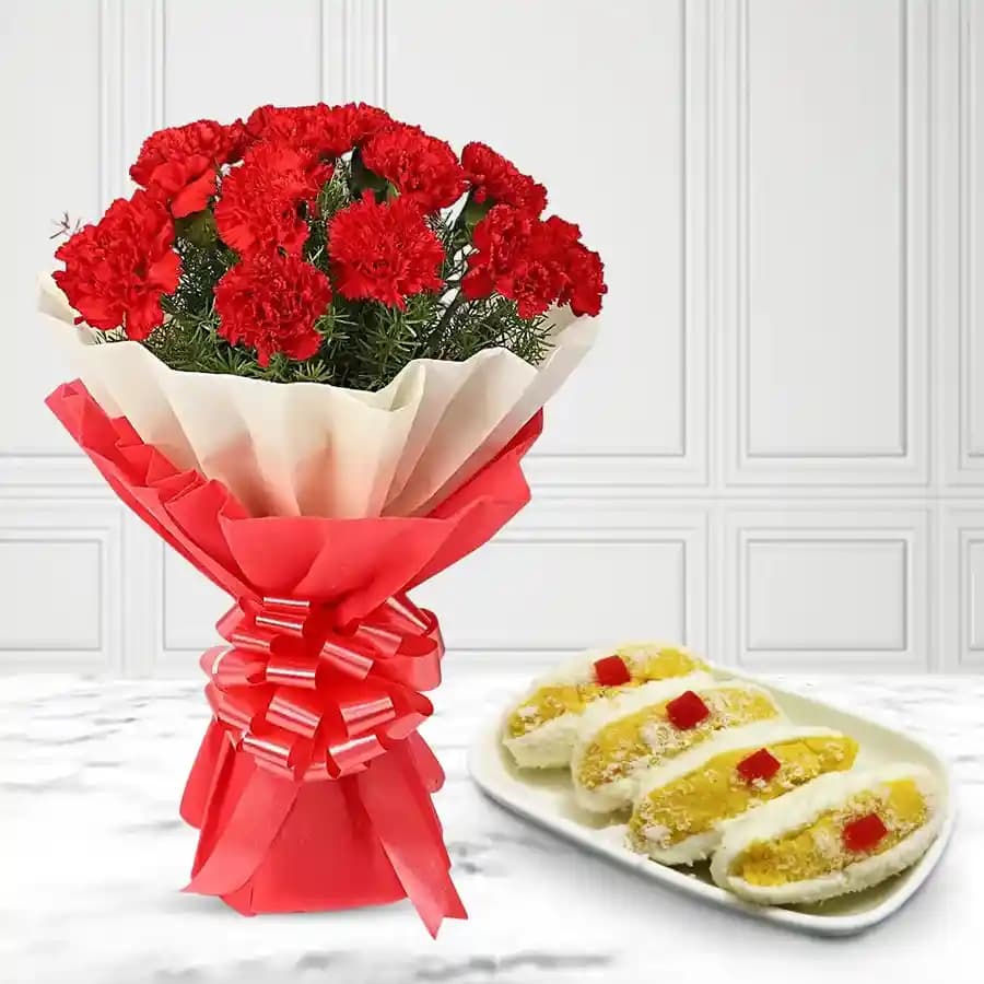 Cham Cham from Karachi Sweet Mart with Red Carnation Tissue Wrapped Bouquet