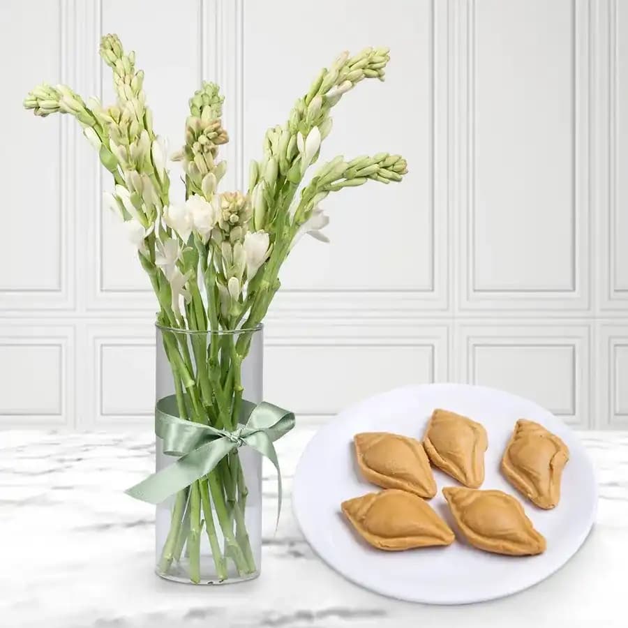 Nolen Gurer Shankh Sandesh from Ganguram with Rajnigandha Stems