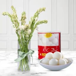 Canned Rossogolla from K.C.Das with Rajnigandha Stems 1