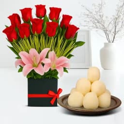 Canned Rossogolla from K.C.Das with Designer Flower Arrangement 1