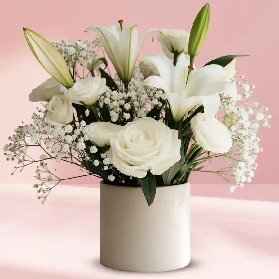 Mixed White Flowers in a Ceramic Pot / Vase