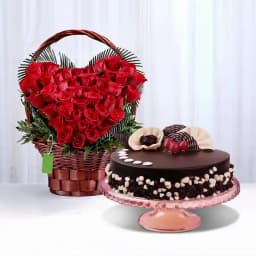 Decadent Chocolate Cake with Elegant Rose Arrangement 1