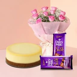 Luxury Cheesecake Delight with Floral and Chocolate Treats 1