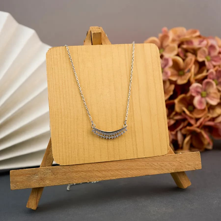 LustreWave Silver Curve Pendant